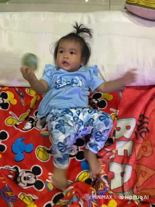 Baby on Mickey Blanket Playing with Toy – AI Generated Video | Hailuo AI