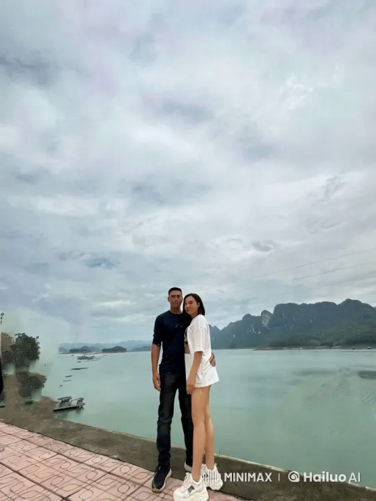 Couple Performs Kungfu in Scenic Mountain Lake Setting – AI Generated Video | Hailuo AI