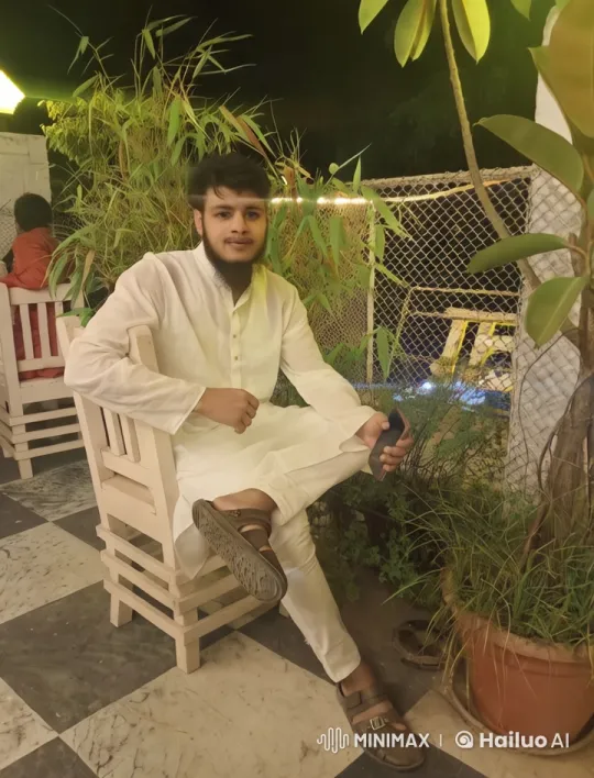 Young Man Relaxing in Outdoor Setting – AI Generated Video | Hailuo AI