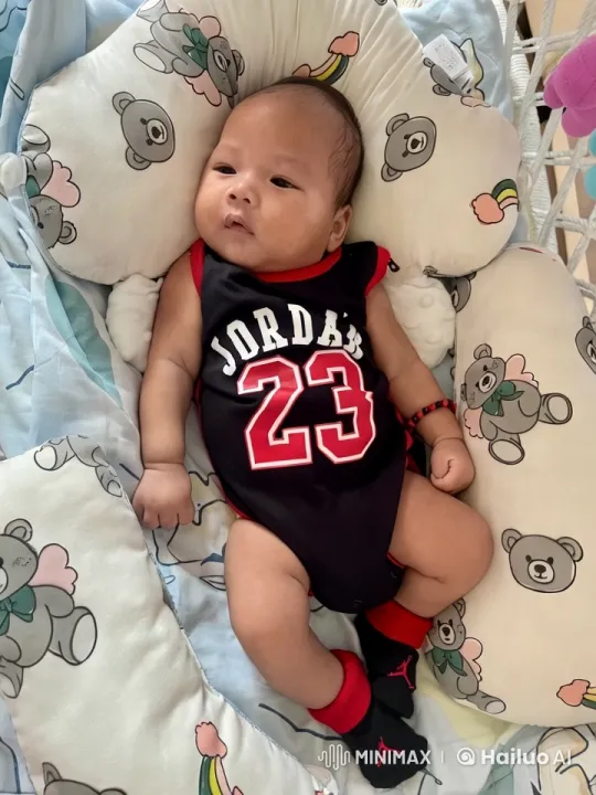 Baby in Soft Blanket with Colorful Outfit – AI Generated Video | Hailuo AI