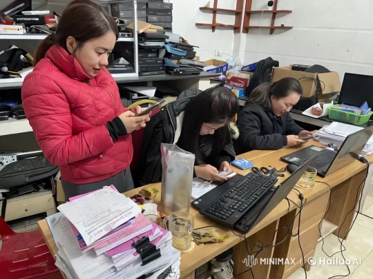 Women Focused on Work in a Cluttered Office – AI Generated Video | Hailuo AI