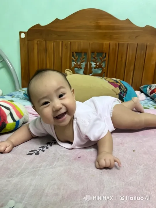 Baby Joyfully Dancing and Punching on Bed – AI Generated Video | Hailuo AI