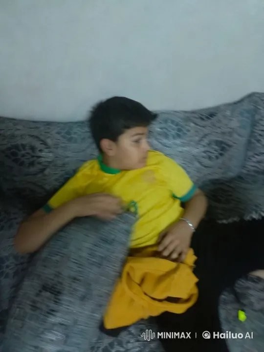 Boy Showcases Kung Fu and Dance Skills on Sofa – AI Generated Video | Hailuo AI