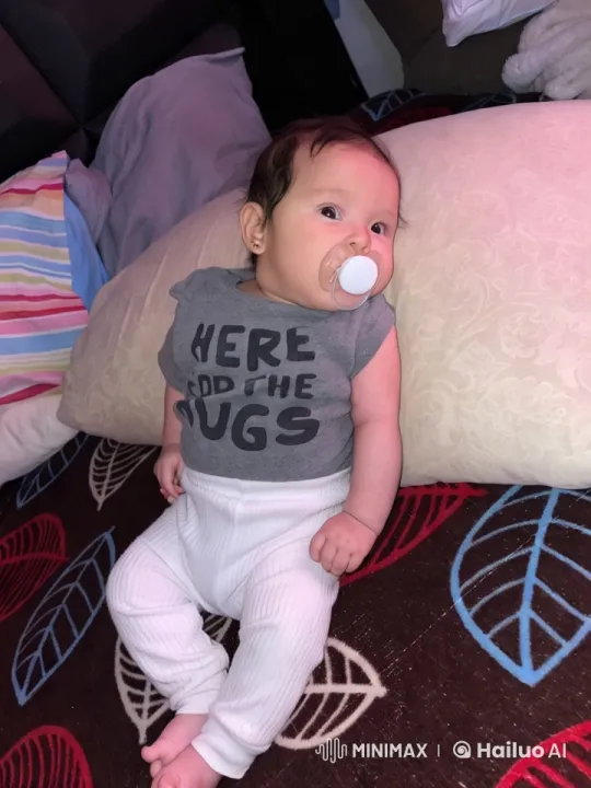 Baby Dances Playfully on Cozy Bed – AI Generated Video | Hailuo AI