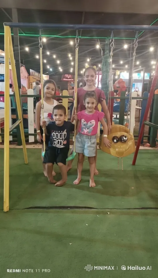 Children's Joyful Play in Amusement Park Setting – AI Generated Video | Hailuo AI