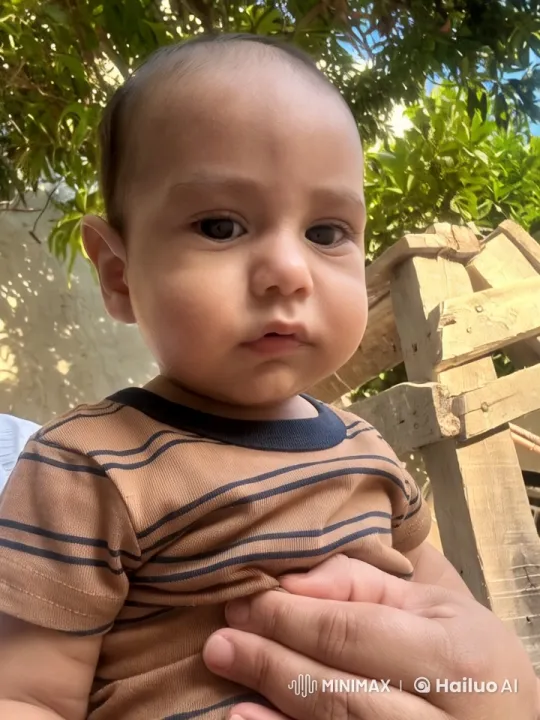 Baby's Joyful Dance in Lush Outdoor Setting – AI Generated Video | Hailuo AI