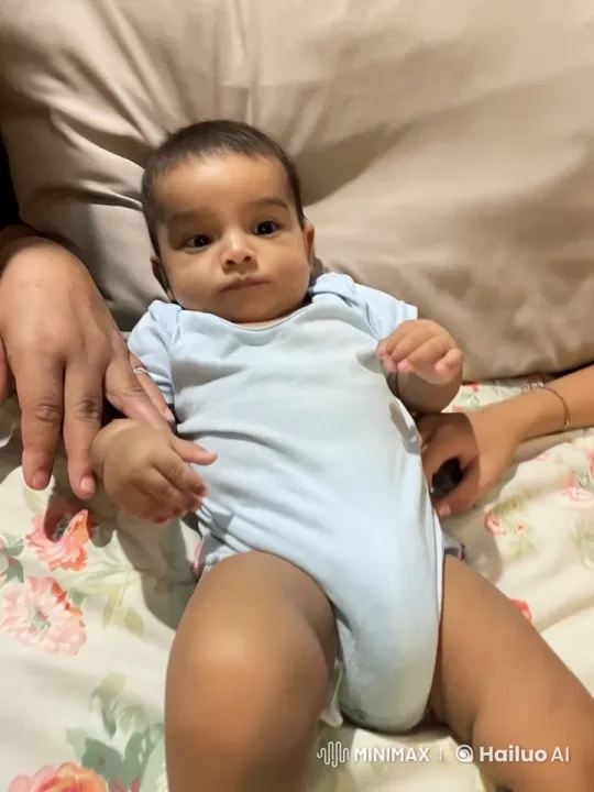 Baby's Joyful Dance on Floral Bed – AI Generated Video | Hailuo AI