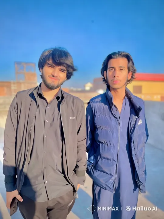 Two Young Men Playfully Fighting on a Rooftop – AI Generated Video | Hailuo AI