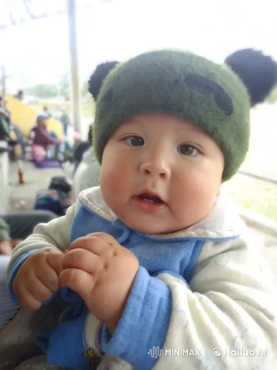 Baby in Green Hat Shows Off Playful Kung Fu Moves – AI Generated Video | Hailuo AI