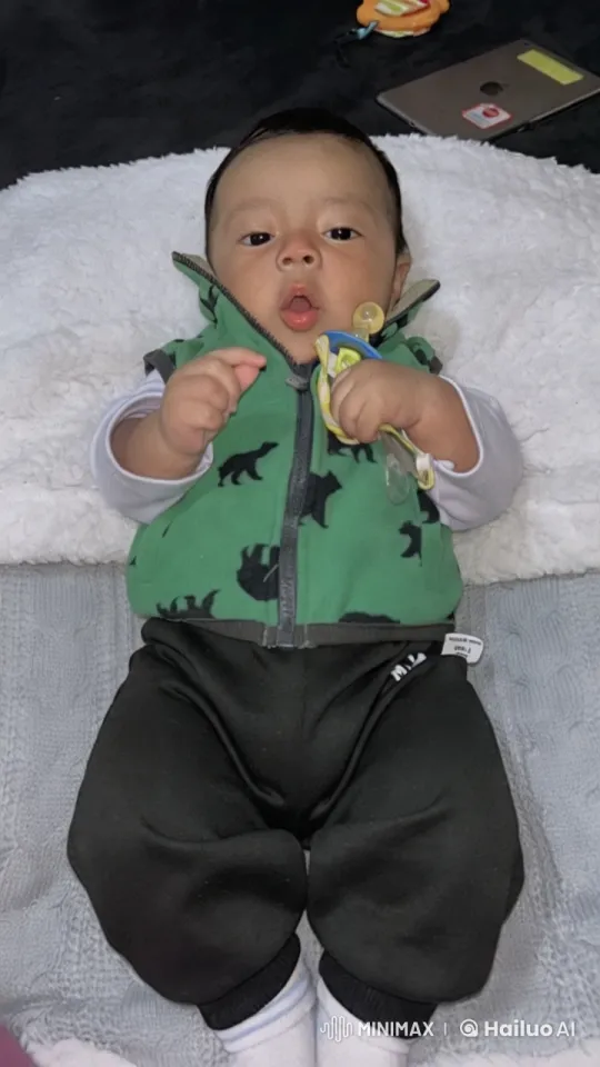 Innocent Charm: Close-up of Curious Baby – AI Generated Video | Hailuo AI