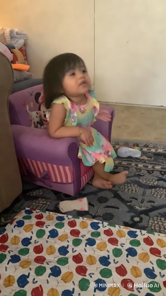 Child in Cozy Living Room with Minnie Chair – AI Generated Video | Hailuo AI