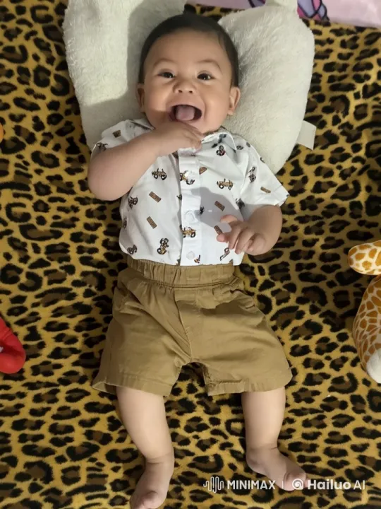 Baby Dances Joyfully on Leopard Print Blanket – AI Generated Video | Hailuo AI
