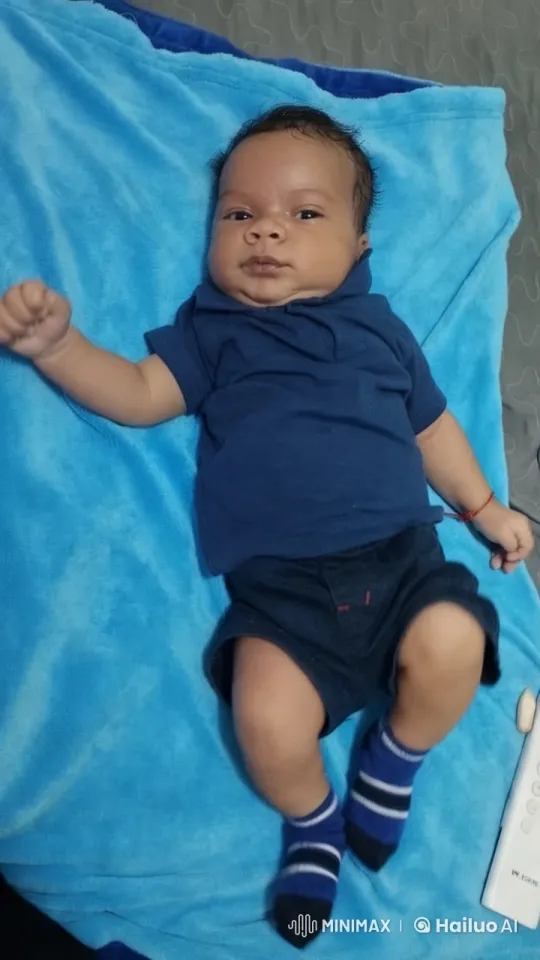 Baby Dancing Joyfully on Blue Blanket – AI Generated Video | Hailuo AI