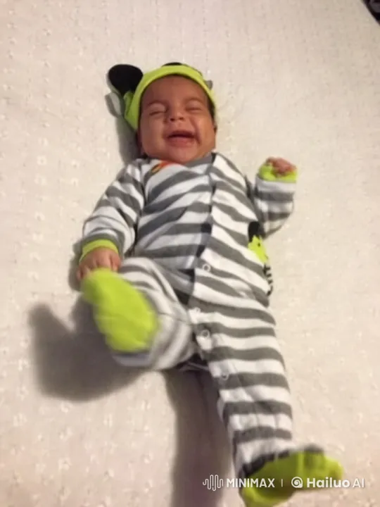 Baby's Joyful Dance on Textured Blanket – AI Generated Video | Hailuo AI