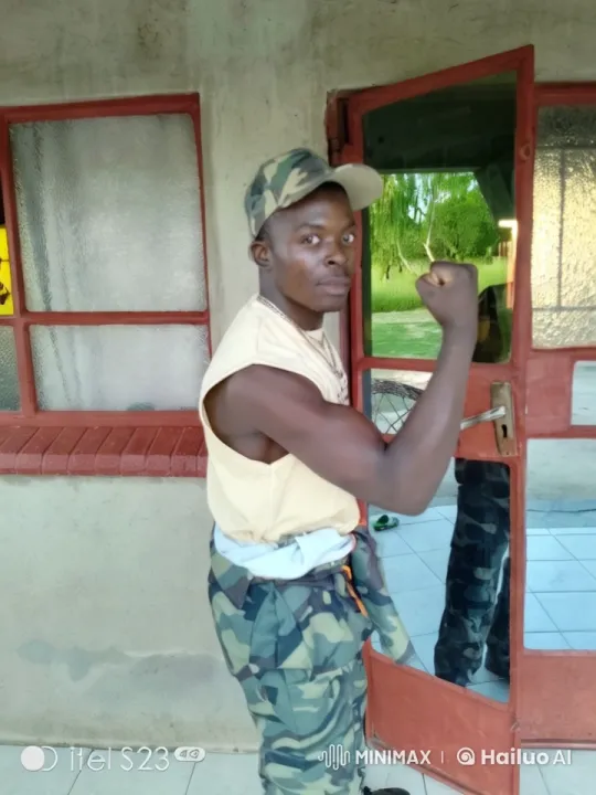 Young Man Showcases Strength in Rustic Outdoor Setting – AI Generated Video | Hailuo AI