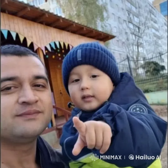 Man and Boy Share Playful Moment in Cozy Setting – AI Generated Video | Hailuo AI