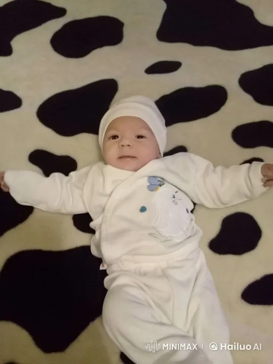 Baby Dancing Cheerfully on Cow-Print Blanket – AI Generated Video | Hailuo AI