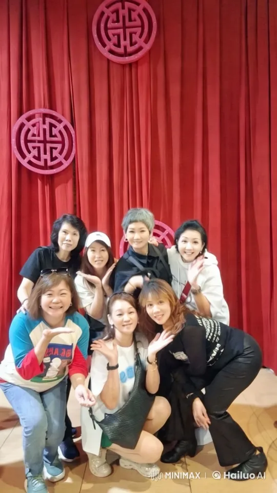 Cheerful Women Posed with Red Curtain Background – AI Generated Video | Hailuo AI