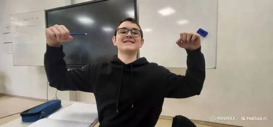 Young Man in Classroom With Paper Marked 'Picun' – AI Generated Video | Hailuo AI