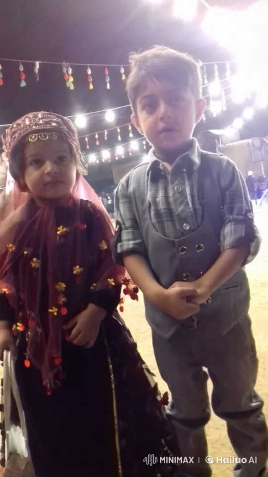 Joyful Celebration: Children in Festive Attire with Twinkling Lights – AI Generated Video | Hailuo AI