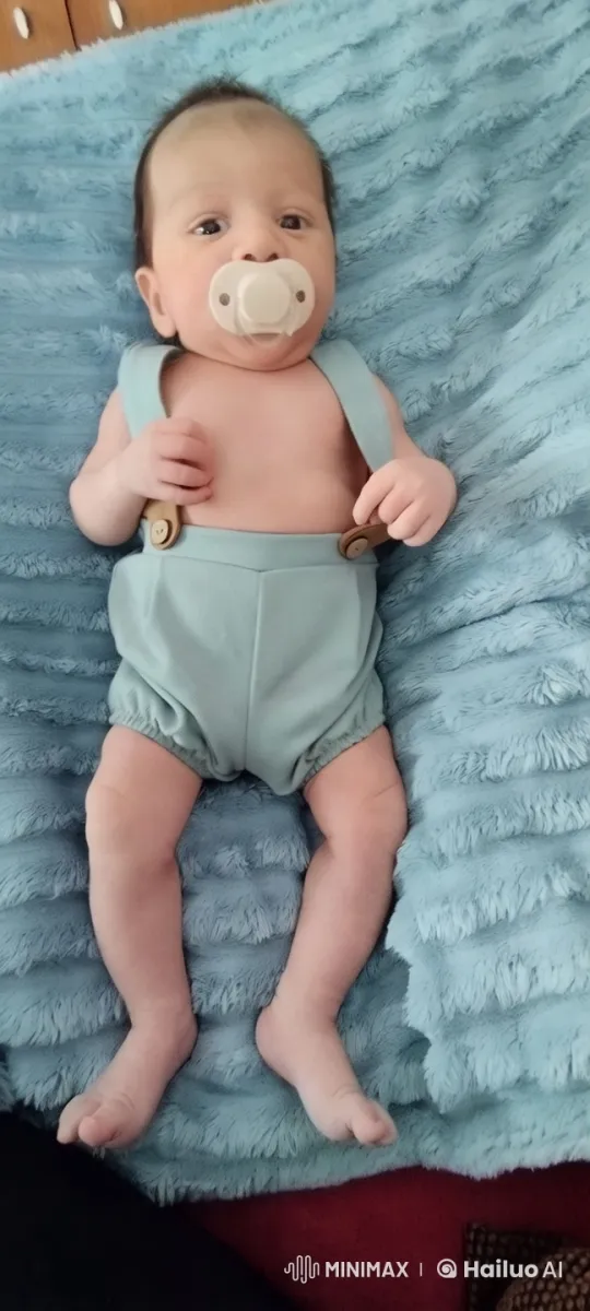 Baby on Blanket in Serene, Cozy Setting – AI Generated Video | Hailuo AI