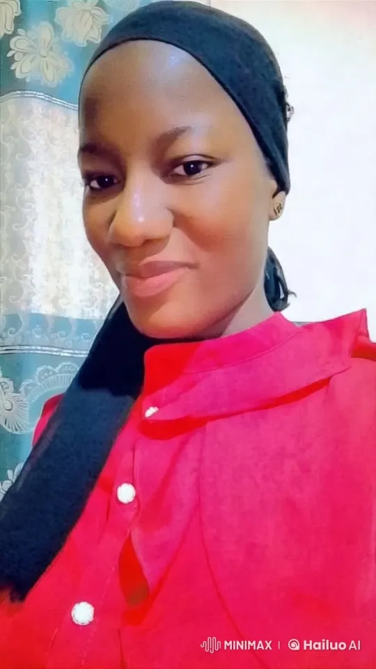 Vibrant Red Blouse with Elegant Black Headscarf – AI Generated Video | Hailuo AI