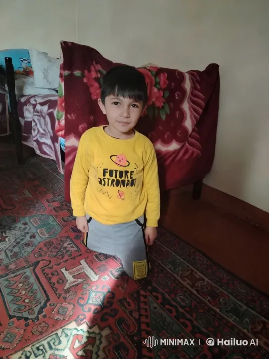 Child on Rug in Cozy Room with Soft Lighting – AI Generated Video | Hailuo AI