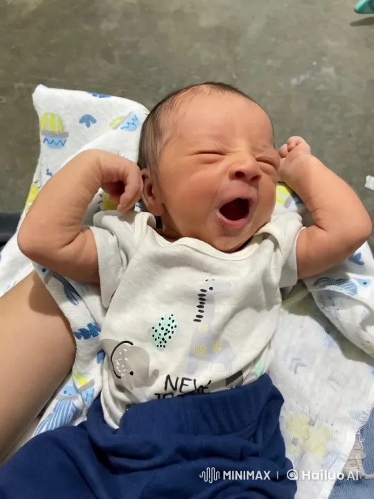 Cute Baby's Gentle Movements in Trendy Outfit – AI Generated Video | Hailuo AI