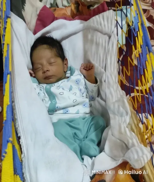 Baby Dancing Joyfully in Colorful Hammock – AI Generated Video | Hailuo AI