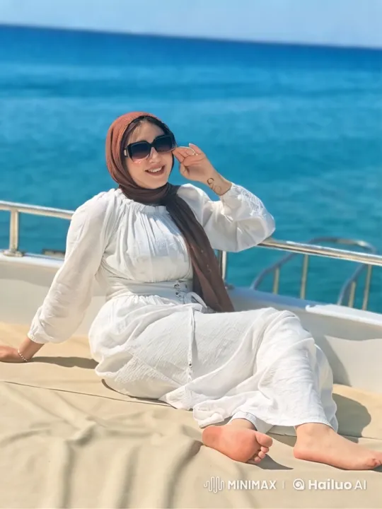 Woman in White Jumps from Boat into Ocean – AI Generated Video | Hailuo AI
