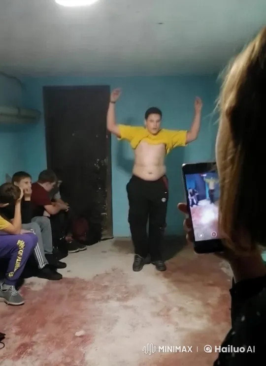 Young Man Lifts Shirt in Dimly Lit Room – AI Generated Video | Hailuo AI
