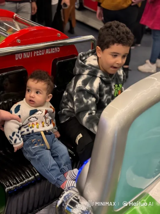 Children Enjoy Amusement Park Ride Amidst Vibrant Atmosphere – AI Generated Video | Hailuo AI