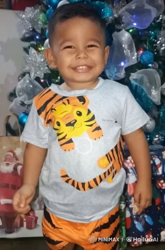 Child Dancing Joyfully in Front of Christmas Tree – AI Generated Video | Hailuo AI