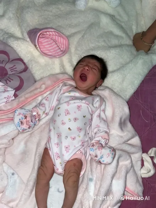 Baby's Gentle Movements in Cozy Surroundings – AI Generated Video | Hailuo AI