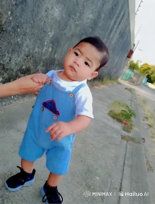Child Practicing Kung Fu Moves on Concrete Pathway – AI Generated Video | Hailuo AI