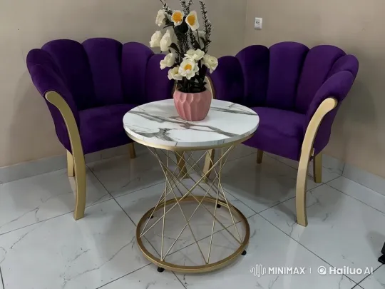 Elegant Interior with Velvet Chairs and Floral Table Centerpiece – AI Generated Video | Hailuo AI