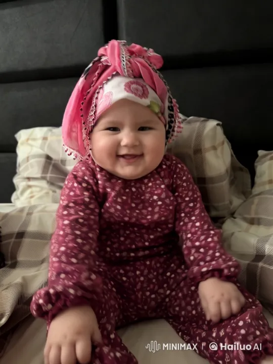 Baby Joyfully Dancing and Playing on Bed – AI Generated Video | Hailuo AI