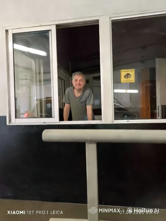 Man Dances Subtly Behind Window Counter – AI Generated Video | Hailuo AI