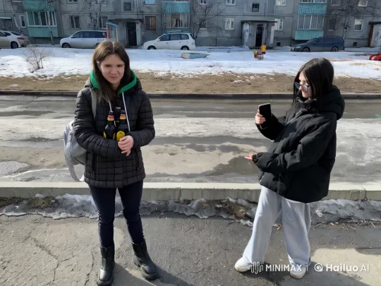 Two Women on Sidewalk in Snowy Residential Area – AI Generated Video | Hailuo AI