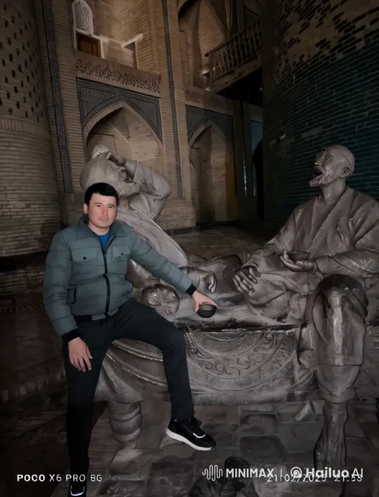 Man on Bench Interacts with Sculpture in Ornate Courtyard – AI Generated Video | Hailuo AI