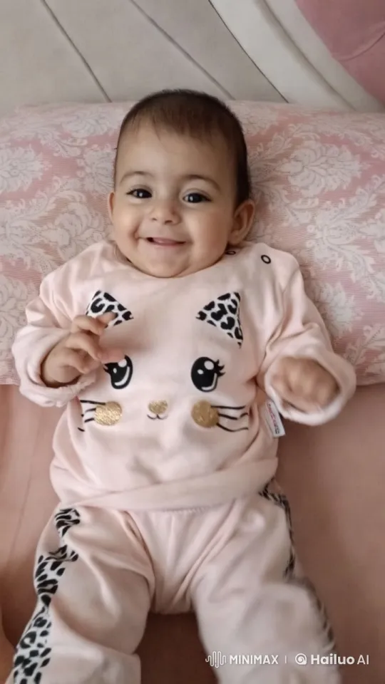 Baby's Joyful Dance on Patterned Bedding – AI Generated Video | Hailuo AI
