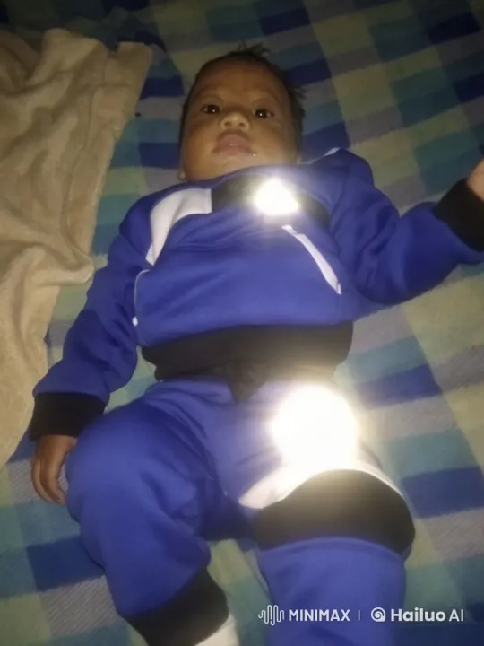 Baby Dancing with Joy on Checkered Blanket – AI Generated Video | Hailuo AI