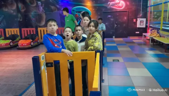Children Anticipate Fun in Colorful Indoor Amusement Setting – AI Generated Video | Hailuo AI