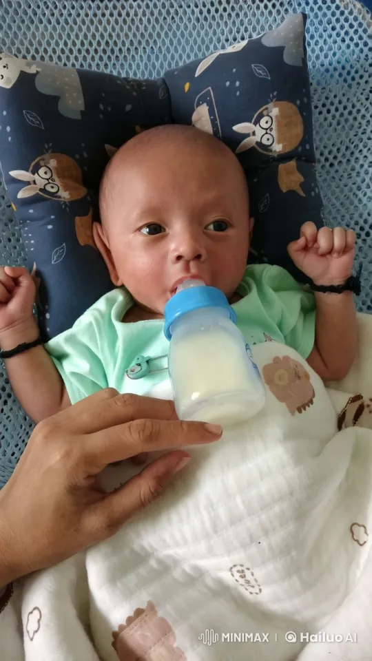 Baby Feeding Moment in Serene, Aesthetic Setting – AI Generated Video | Hailuo AI