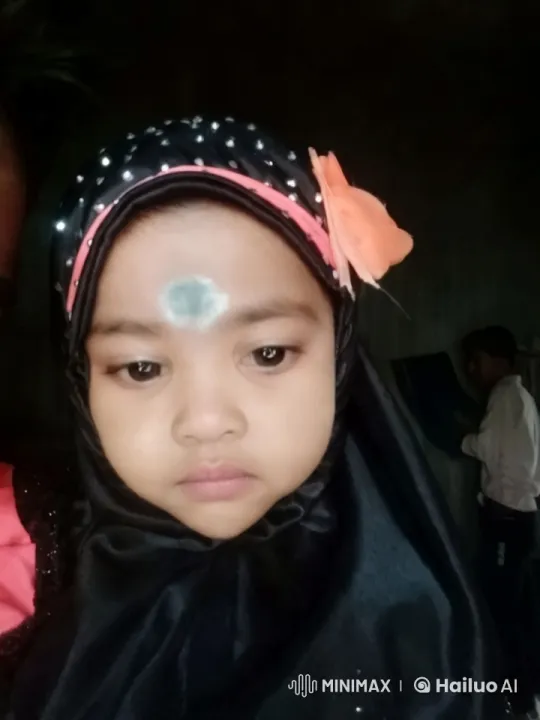 Girl in Decorative Headscarf: A Study in Calm – AI Generated Video | Hailuo AI