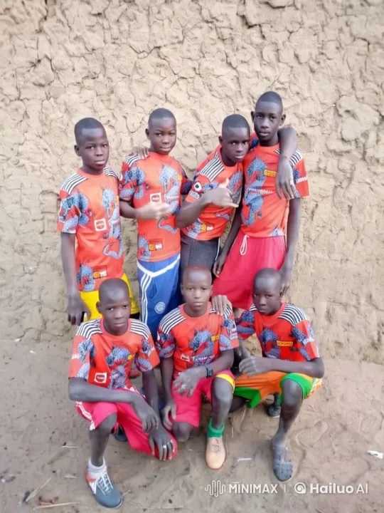 Boys in Sports Jerseys Pose with Camaraderie – AI Generated Video | Hailuo AI