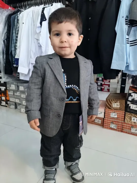 Child's Joyful Dance in Trendy Clothing Store – AI Generated Video | Hailuo AI