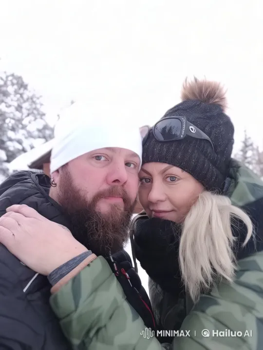 Couple Embraces Passionately in Snowy Landscape – AI Generated Video | Hailuo AI