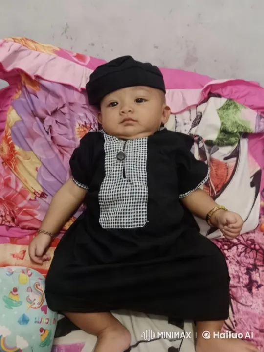 Baby on Vibrant Bed in Aesthetic Close-Up – AI Generated Video | Hailuo AI