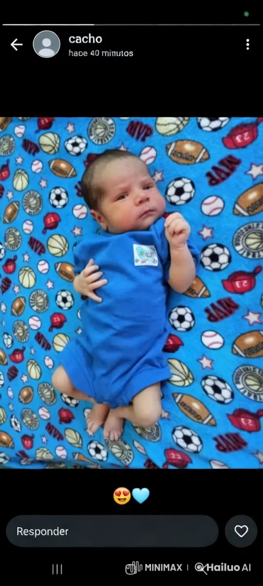 Baby Resting on Sports-Themed Blanket – AI Generated Video | Hailuo AI